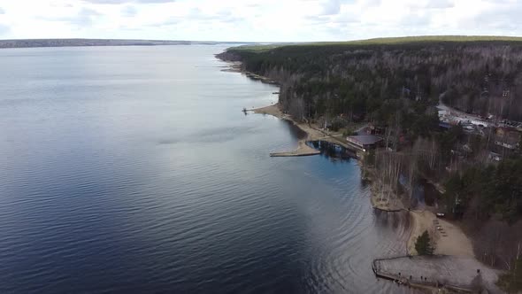 Aerial View of the Vuoksi River, the Forest and the Settlement in Autumn Day, Losevo, Leningrad