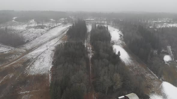 Empty Ski Resort Center First Snow Aerial Reveal