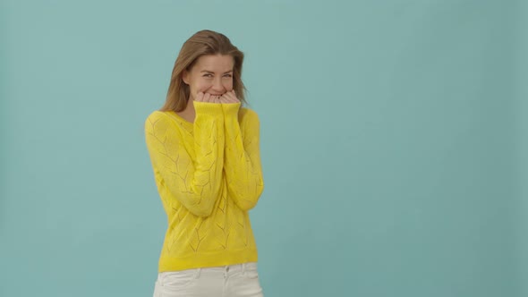 Woman in Yellow Top Laughing