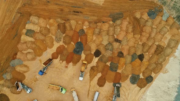 Trucks Loaded With Sand on Construction Site alt