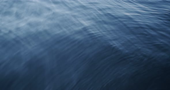 Background Image of a Small Wave Phantom Blue Sea alt