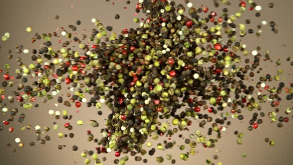Super Slow Motion Shot of Pepper Seasoning Side Collision on Brown Background at 1000Fps. alt
