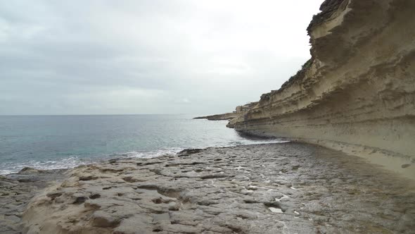 Stone Beach Il-Kalanka in Malta Dissapears in Shallow Waters of Mediterranean Sea