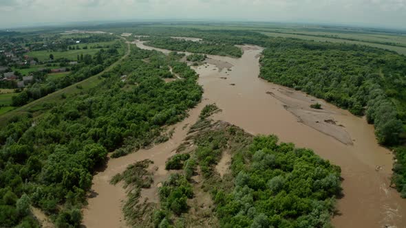 Aerial Drone View. Rriver Water Big and Dirty After Heavy Rain. Wide View V3 alt