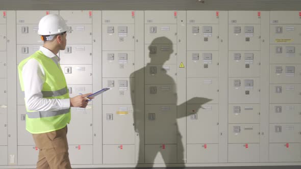 The Man in the Control Center of the Power Plant. alt