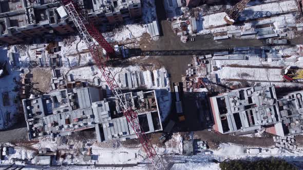 Aerial view of construction site in winter season.