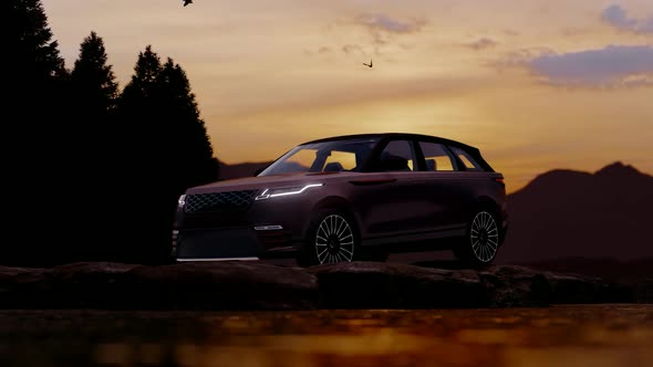 Anthracite Gray Luxury Off-Road Vehicle Standing on the Rocky Area at Sunset