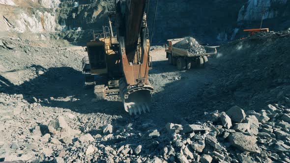 Machines are Removing Ore Out of the Mine Site alt