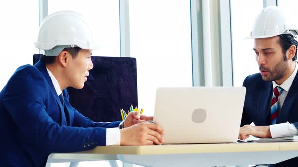 Engineer and Architect Meeting at Office Table alt