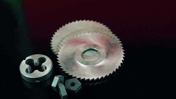 Close-up on a black background isolated rotary disk cutters, die, carbide inserts alt