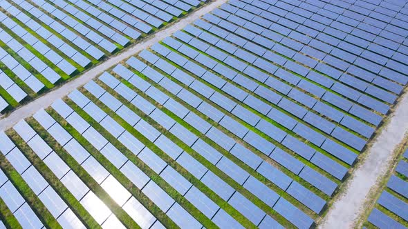 Eco Power Save Earth Solar power plant and 4K aerial view. Renewable energy. Green tech. alt