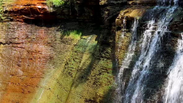 A tricolor display of moss, clay, and water in the middle of Cleveland Ohio. Brandy wine falls 2021. alt