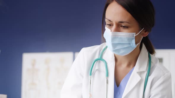 Video of doctor during giving injection to a patient. Shot with RED helium camera in 8K. alt