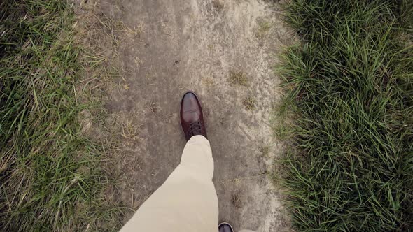 Stylish Businessman Legs In Leather Shoes Walking On Vacation Holiday In Warm Autumn Day. alt