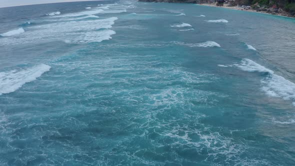 Aerial View Mesmerizing Frothy Blue Sea Waves Splashing Towards alt