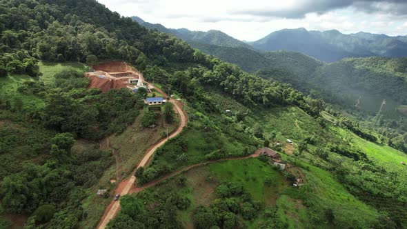 Aerial view of Pa kha village,  Houses in valley, Chiang Mai, Thailand by drone