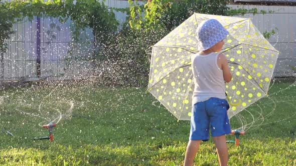 Exciting games outdoor. Happy childhood concept. Watering system. Alternative studying.