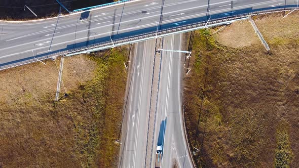 Aerial Drone View of Highway Multilevel Junction Road with Moving Cars alt