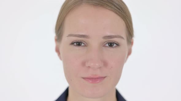 Face Close Up of Serious Young Businesswoman Looking at Camera alt