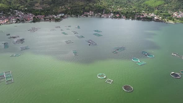 Aerial view of fish farm pools in Talisay, Philippines. alt
