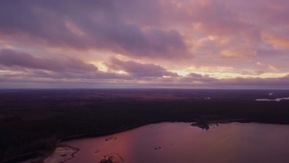 Lake Sunset View with Islands, Aerial Flight Over the Lake