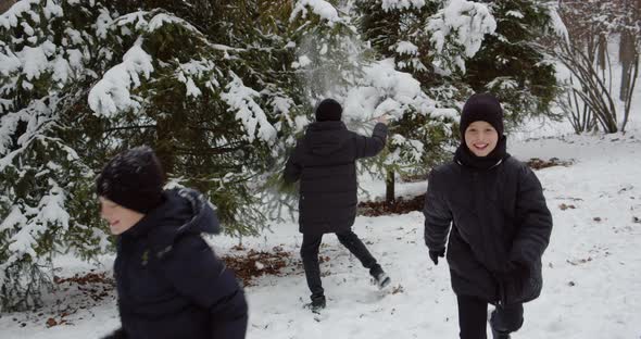 The Boys Rejoice In The First Snow. A Walk In Winter