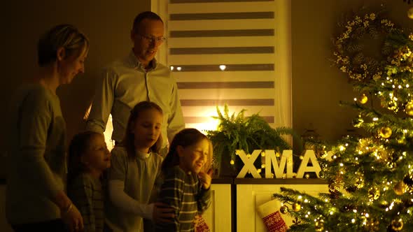Family at Home on Christmas Evening