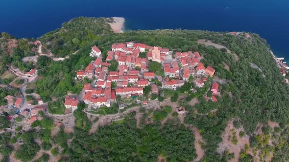 Aerial view of Beli cityscape at the top of mountain, Cres island, Croatia.