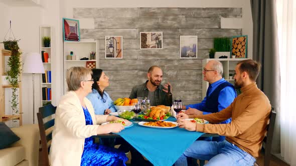 Beautiful Multigenerational Family Having Dinner alt