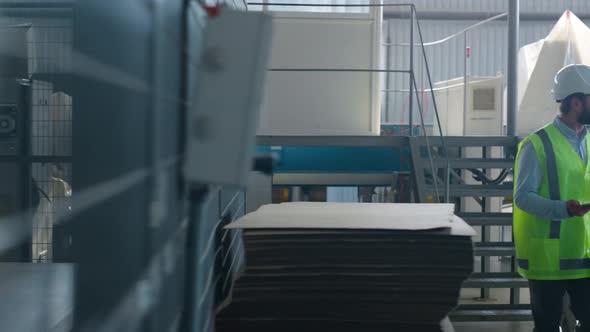 Factory Engineers Inspecting Warehouse Managing Manufacture Production Packages alt