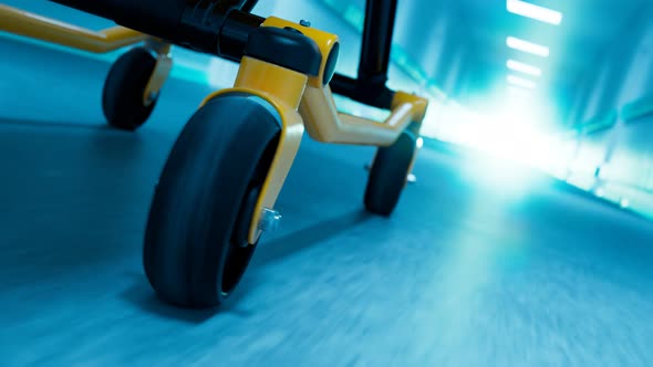 Emergency bed moving fast through a hospital corridor. Looping animation. 4KHD alt