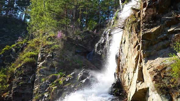 Kamysh Waterfall at Sunset Light Spring Time in the Altai Republic Siberia Russia alt