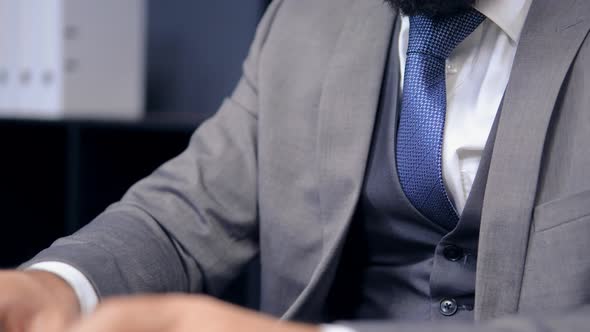 Businessman Sitting in the Office alt