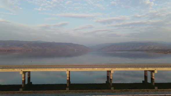 Reflection of the bridge over the river in the magnificent water