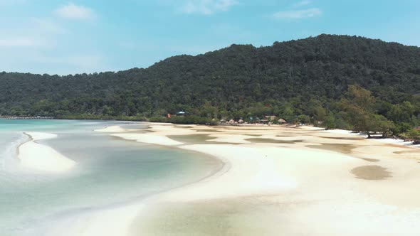 Paradisiac white beach with hammocks near the calm sea water. Koh Rong Samloem, Cambodia alt