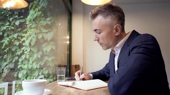 Man working In the coffee shop.