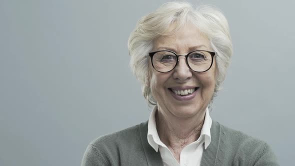 Smiling senior female doctor with stethoscope