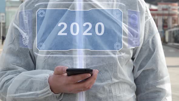 Man in White Uses Holographic Text 2020