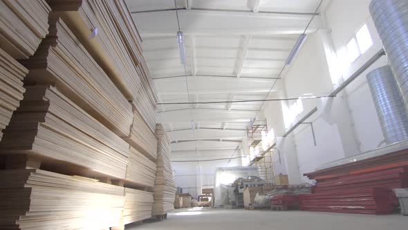 Large Commercial Warehouse with Plywood and Steel Beams alt