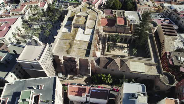 Aerial view over historic Almeria Cathedral-Fortress with Gothic construction alt