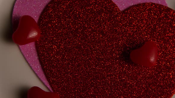 Rotating stock footage shot of Valentines decorations and candies - VALENTINES 0108 alt