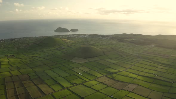 Aerial view of two volcano with plantation field on Terceira Island alt
