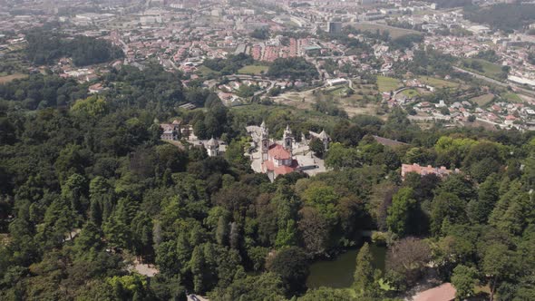 High Aerial view over Bom Jesus Sanctuary Surrounded by nature, Braga city as Background alt