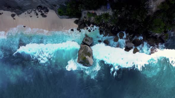 Top Down View on Hidden Sandy Beach with Azure Water alt