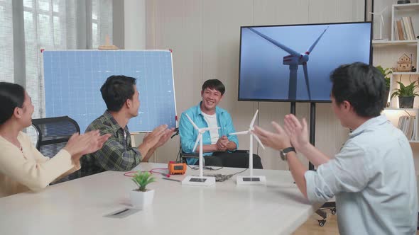 Asian Man Engineer In Wheelchair Succeed Presenting About The Wind Turbine At The Office alt