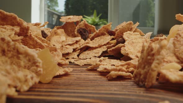 Macro Zoom in Video of Corn Flakes on Wooden Board