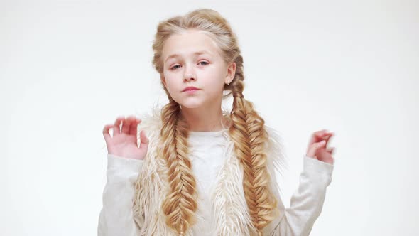 Young Gorgeous Caucasian Girl with Long Luxurious Blonde Hair Standing on White Background and alt
