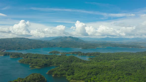 A Lake Among Green Hills and Mountains alt