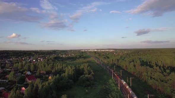 Aerial View of Freight Train Running in the Countryside, Russia alt