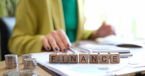 Businesswoman Pointing with Pen at Finance and Profit in Business Closeup  Movie alt